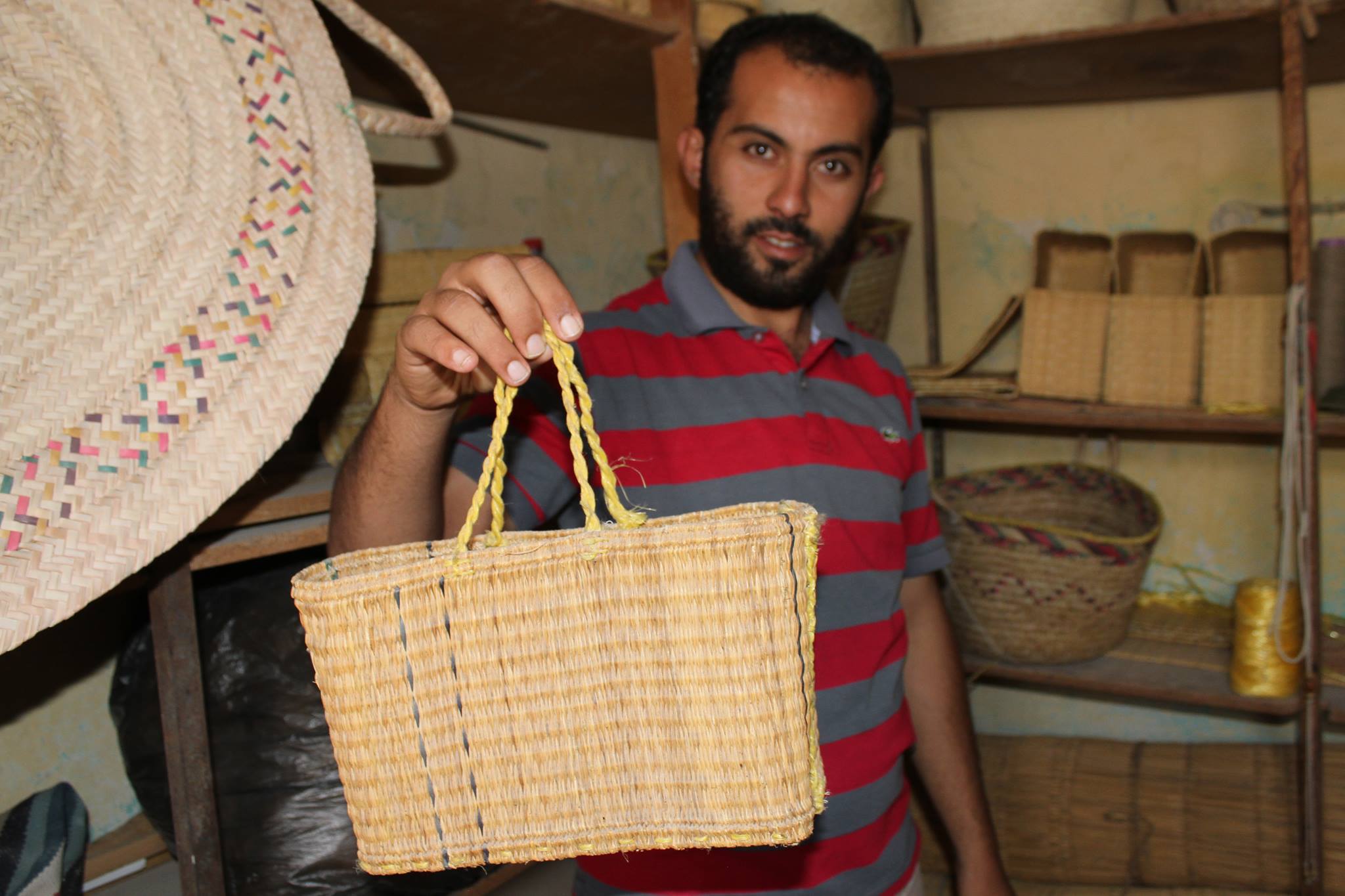 A craftsman making beautiful baskets from wetland plants. Photo: H. Naoufel